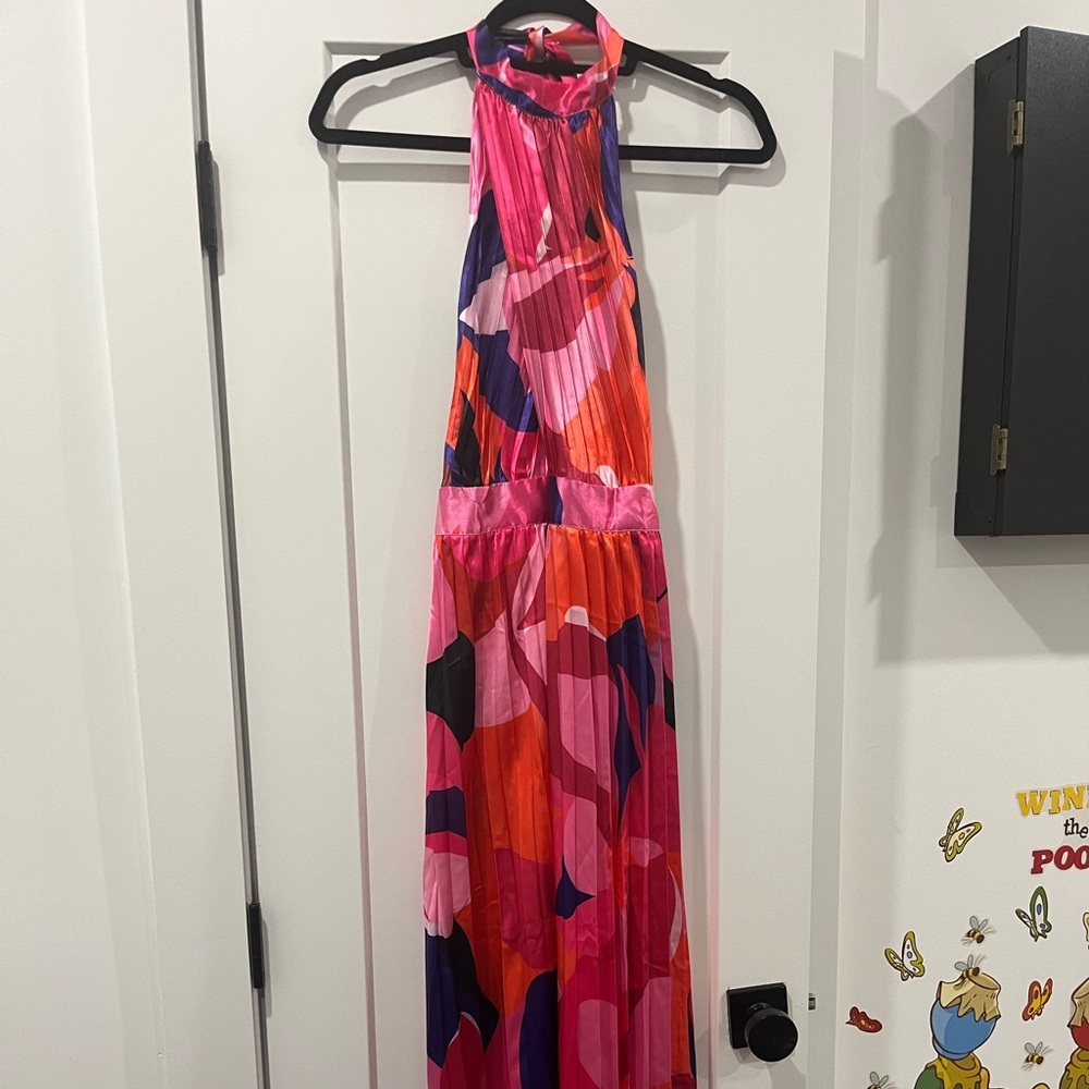 Open back silk gown with tie around the neck